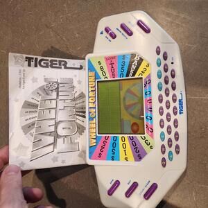 Wheel of Fortune Handheld Electronic Game works perfect EUC condition booklet